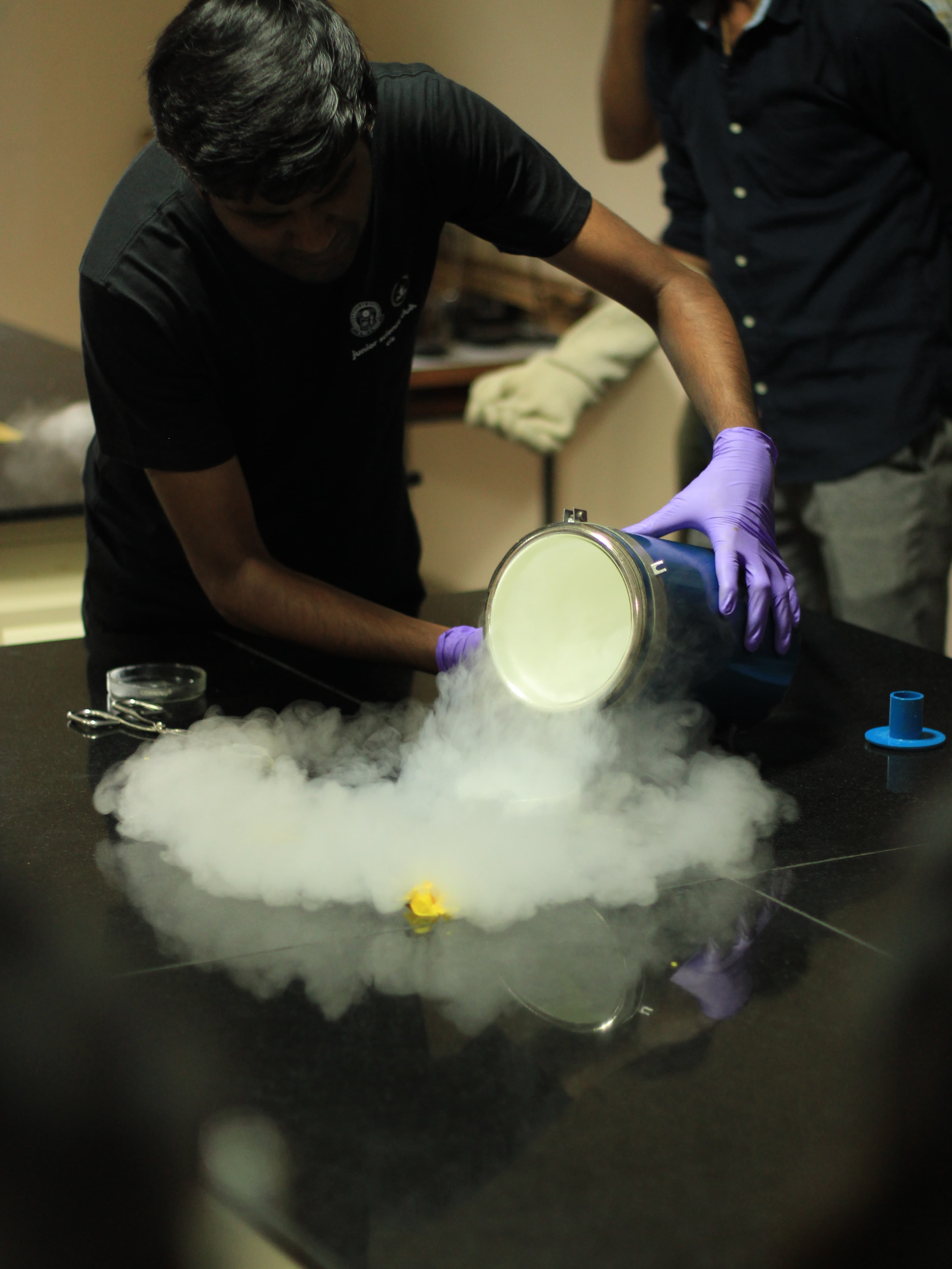 Pouring liquid Nitrogen during a demonstration of superconductivity to school kids